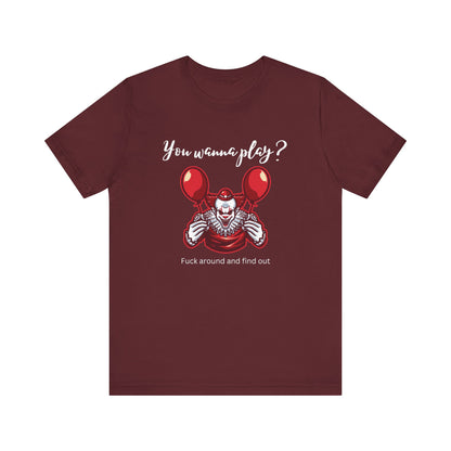 Unisex Halloween Tee stating 'You wanna play? Fuck around and find out.' with Pennywise in color maroon.