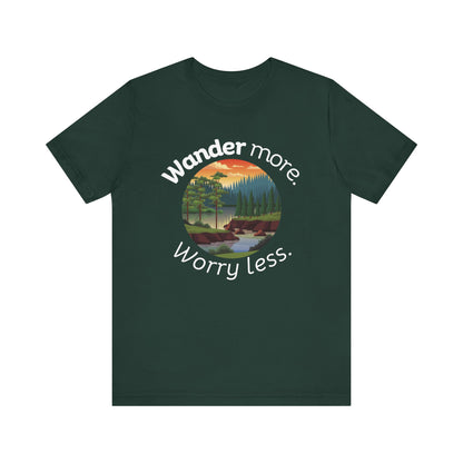 Cotton t-shirt stating 'Wander more. Worry less.' in color forest