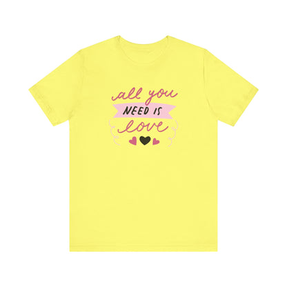 Comfortable Women's Graphic Tee Stating 'All You Need Is Love' in color yellow