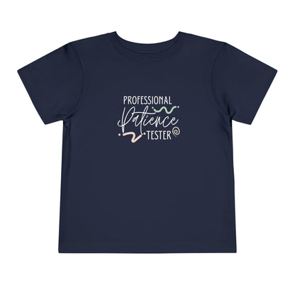 Comfortable funny graphic toddler tee stating 'Professional Patience Tester' in color  navy