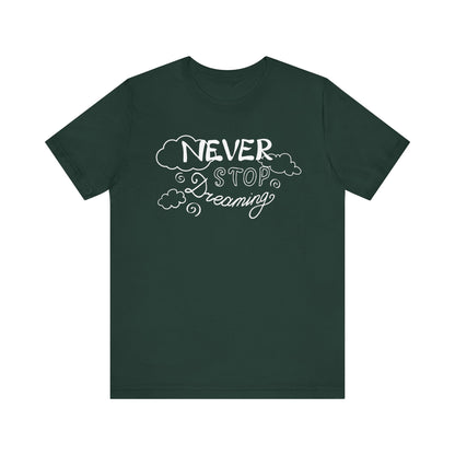Good vibes women's tee stating 'Never Stop Dreaming' in color forest