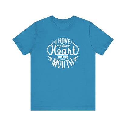 Graphic tee stating 'I have a good heart, but this mouth' in color aqua
