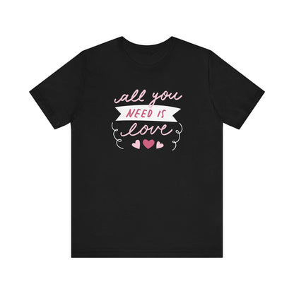 Comfortable Women's Graphic Tee Stating 'All You Need Is Love' in color black