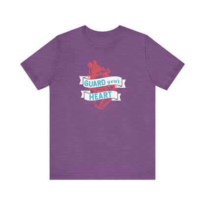 A cotton graphic tee stating 'Guard Your Heart' in color team purple