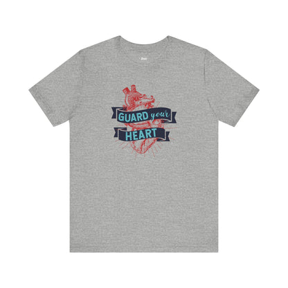 A cotton graphic tee stating 'Guard Your Heart' in color athletic heather