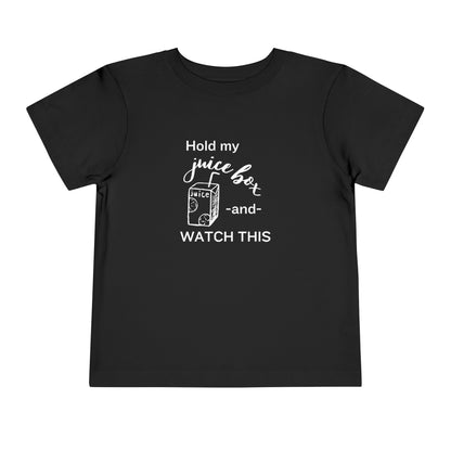 Comfortable funny graphic toddler tee stating 'Hold my juice box and watch this' in color black