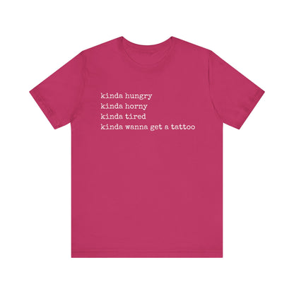 graphic t-shirt stating 'Kinda hungry. Kinda horny. Kinda tired. Kinda wanna get a tattoo" in color berry
