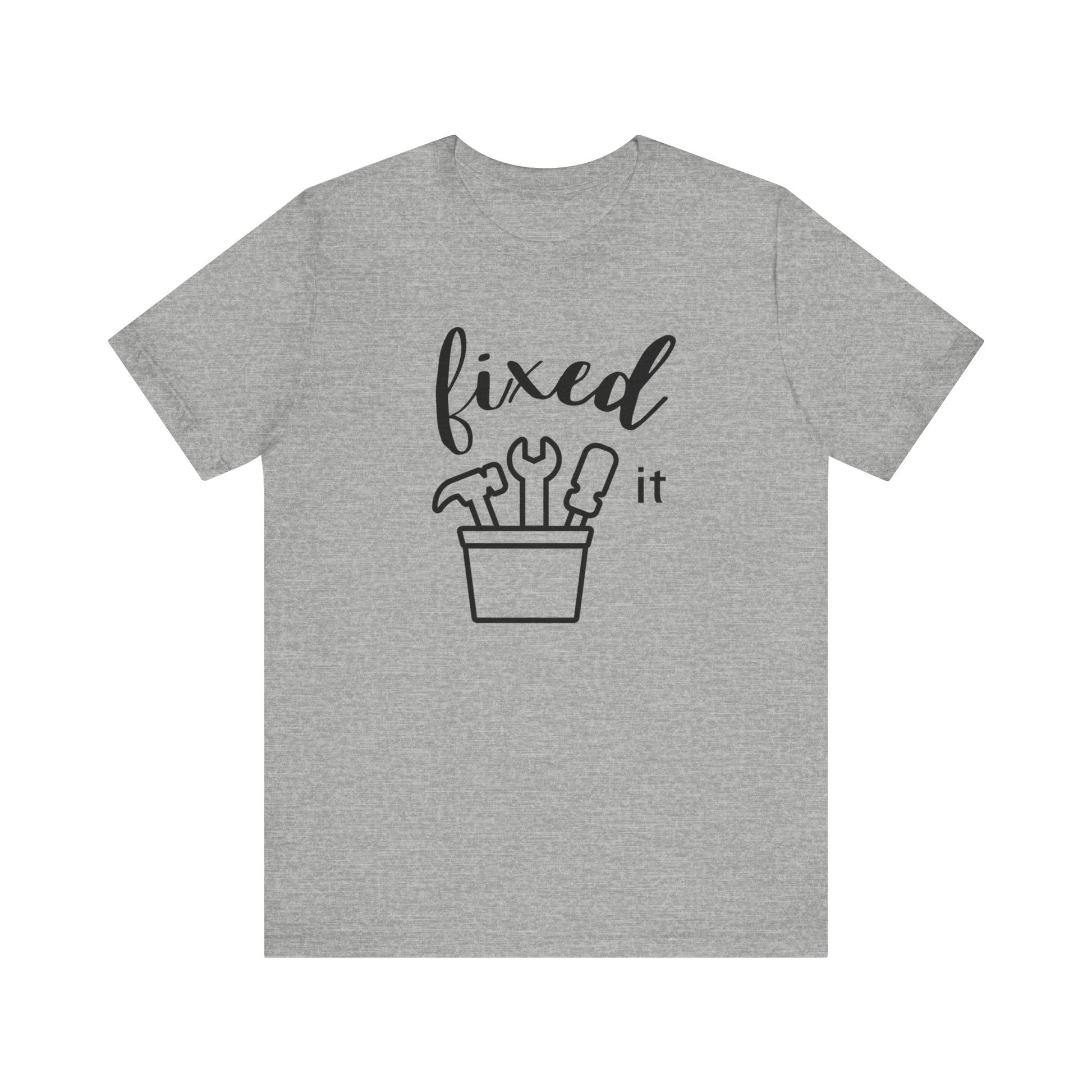 Adult graphic tee stating 'Fixed It' in color athletic heather