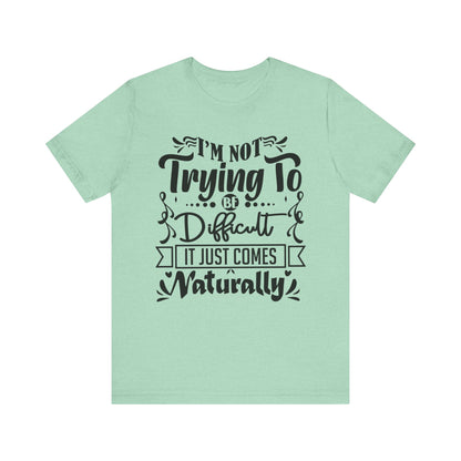 Sarcastic unisex graphic tee stating 'I'm not trying to be difficult, it just comes naturally' in color mint heather