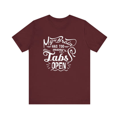 Graphic tee stating 'My brain has too many tabs open' in color maroon