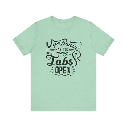 Graphic tee stating 'My brain has too many tabs open' in color mint heather