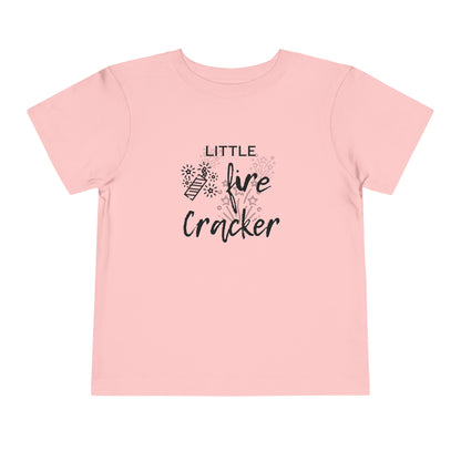 Comfortable funny graphic toddler tee stating 'Little Fire Cracker' in color pink