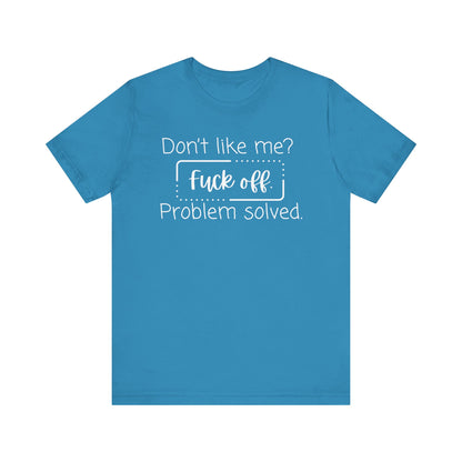 Comfortable unisex adult humor tee stating 'Don't like me? Fuck off. Problem solved.' in color aqua