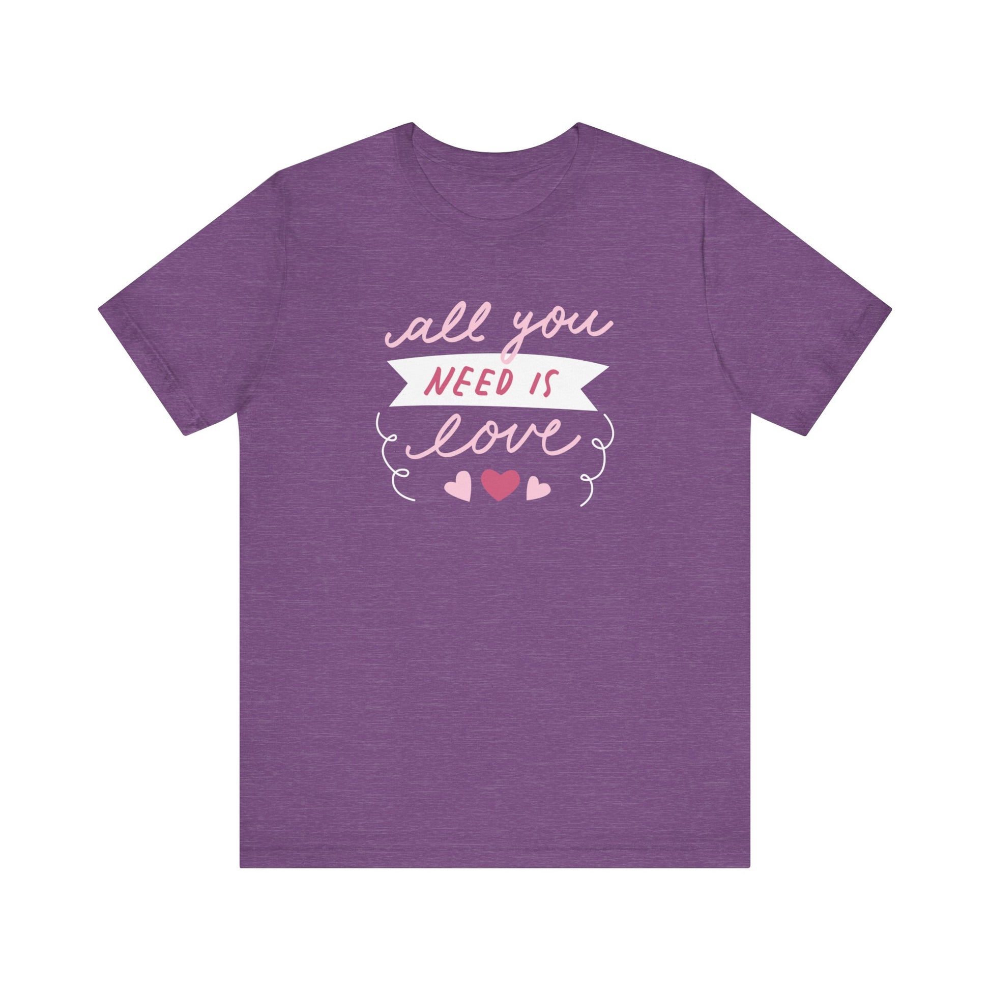 Comfortable Women's Graphic Tee Stating 'All You Need Is Love' in color heather purple