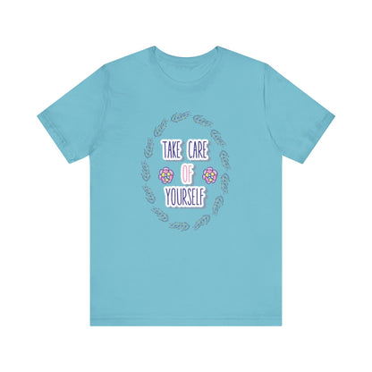 Woman's good vibe graphic tee stating 'Take Care of Yourself' in color aqua