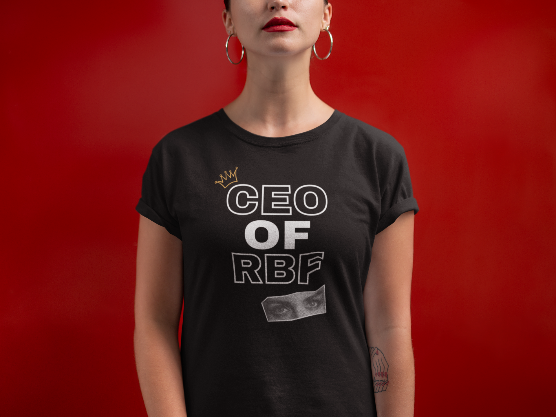 Serious woman with red hair and red lipstick wearing comfortable adult humor tee stating CEO of RBF in color black