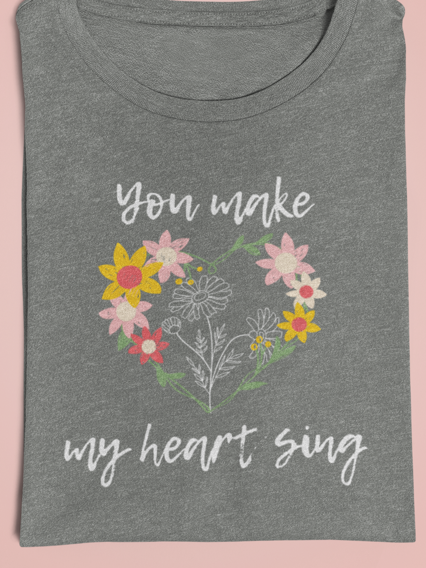 Adult graphic tee stating 'You Make My Heart Sing' in color deep heather