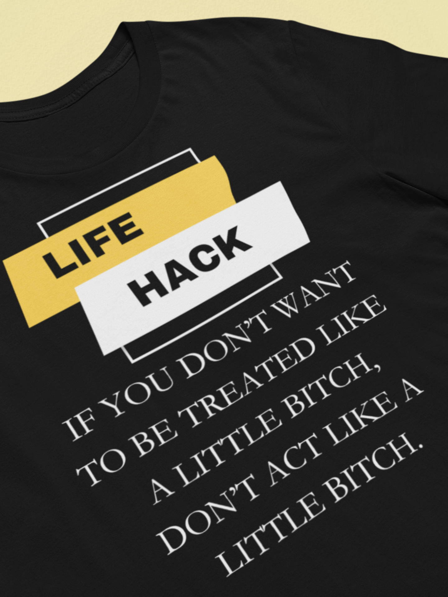 Unisex Adult Humor graphic tee stating 'Life Hack: If you don't want to be treated like a little bitch, don't act like a little bitch' in color black