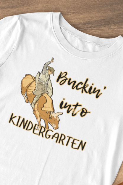 Comfortable toddler tee stating 'Buckin' into Kindergarten' in color white