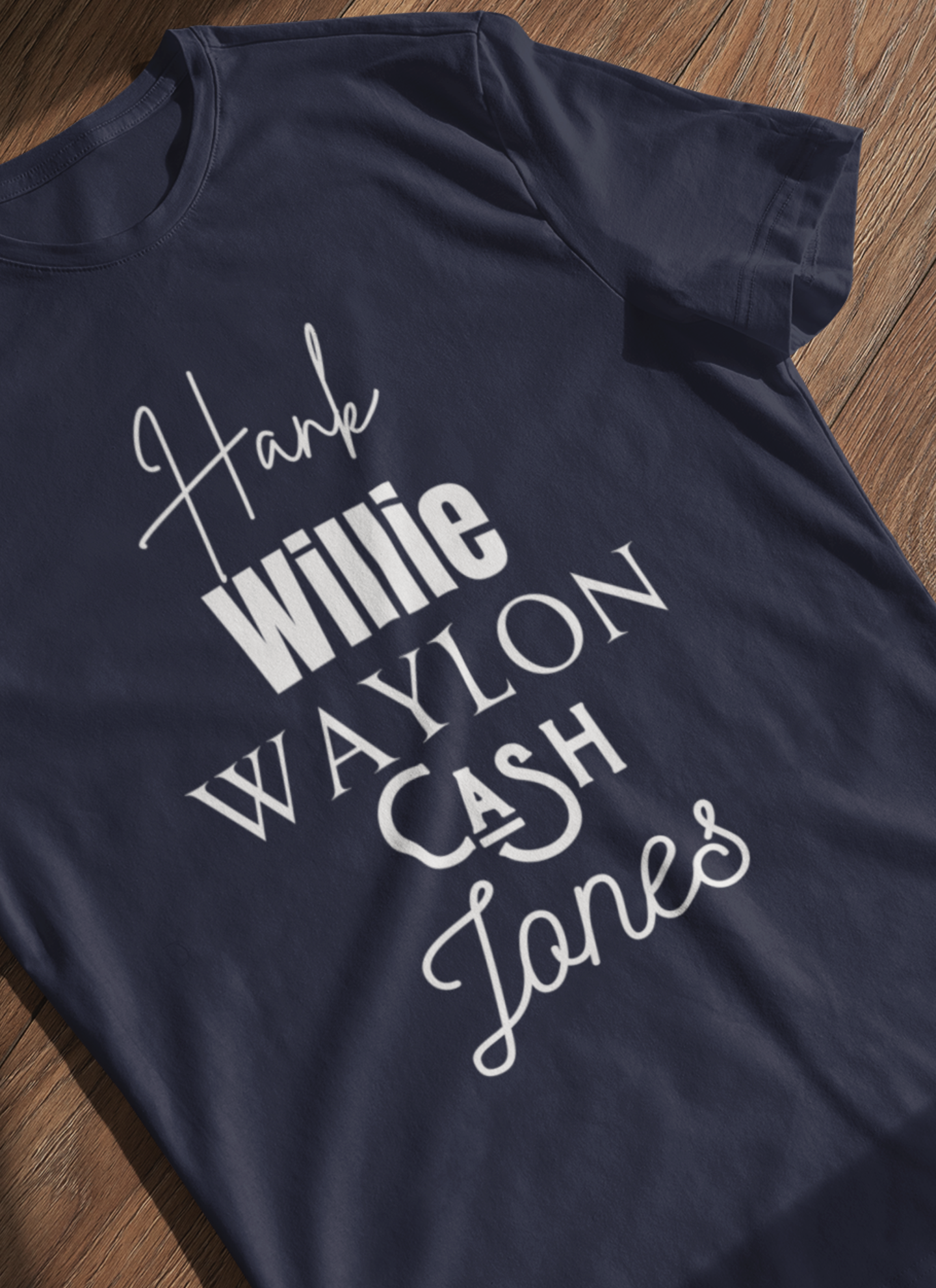 Comfortable Southern Tee stating 'Hank, Willie, Waylon, Cash, Jones' in color navy