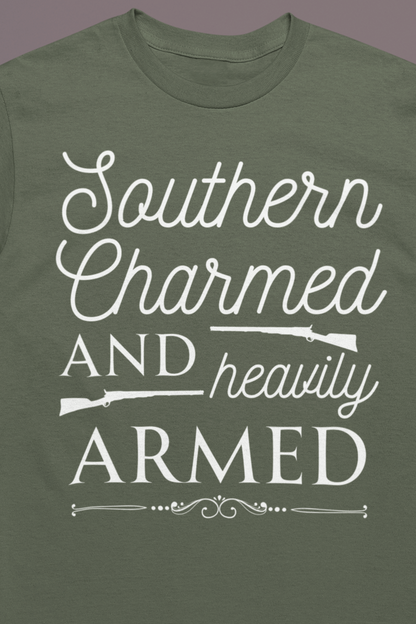 Adult unisex t-shirt stating 'Southern Charmed and Heavily Armed' in color military green
