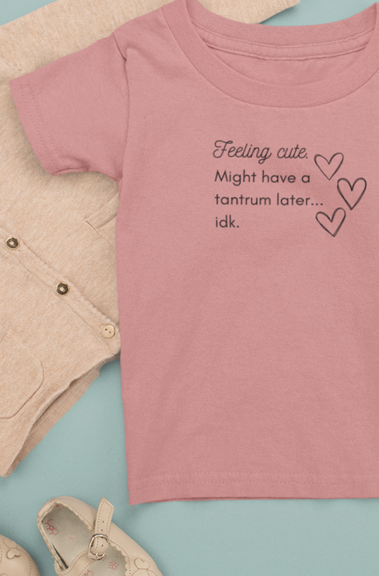 Comfortable funny graphic toddler tee stating 'Feeling cute. Might have a tantrum later...idk' in color heather mauve