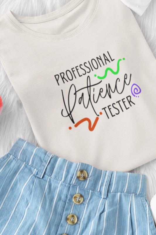 Comfortable funny graphic toddler tee stating 'Professional Patience Tester' in color  dust heather