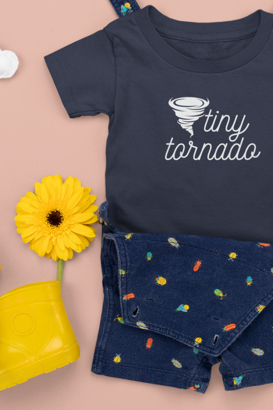 Comfortable funny graphic toddler tee stating 'Tiny Tornado' in color navy 