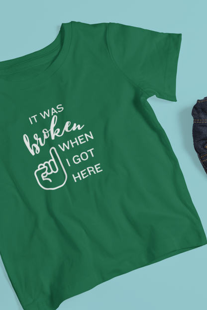 Comfortable funny graphic toddler tee stating 'It was broken when I got here' in color kelly