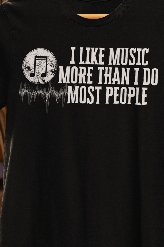 Unisex graphic cotton tee stating 'I like music more than I do most people' in color black