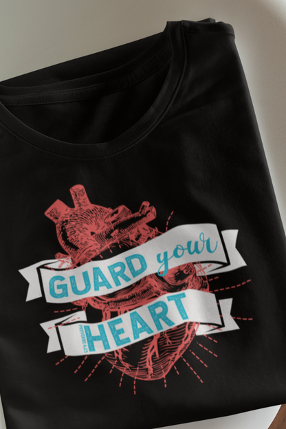 A cotton graphic tee stating 'Guard Your Heart' in color black