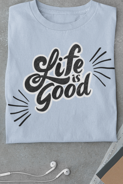 Folded cotton shirt stating 'Life is Good' in color baby blue