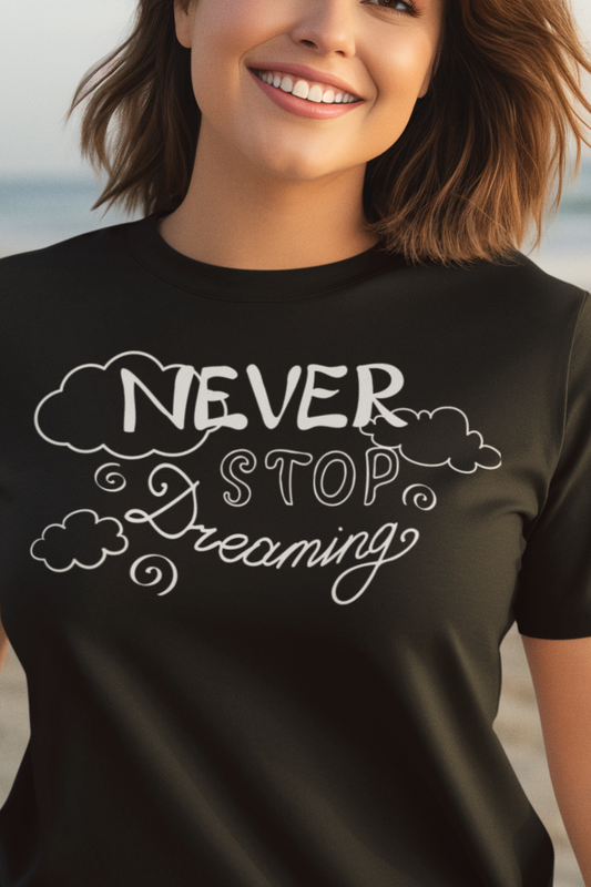 Good vibes women's tee stating 'Never Stop Dreaming' in color black