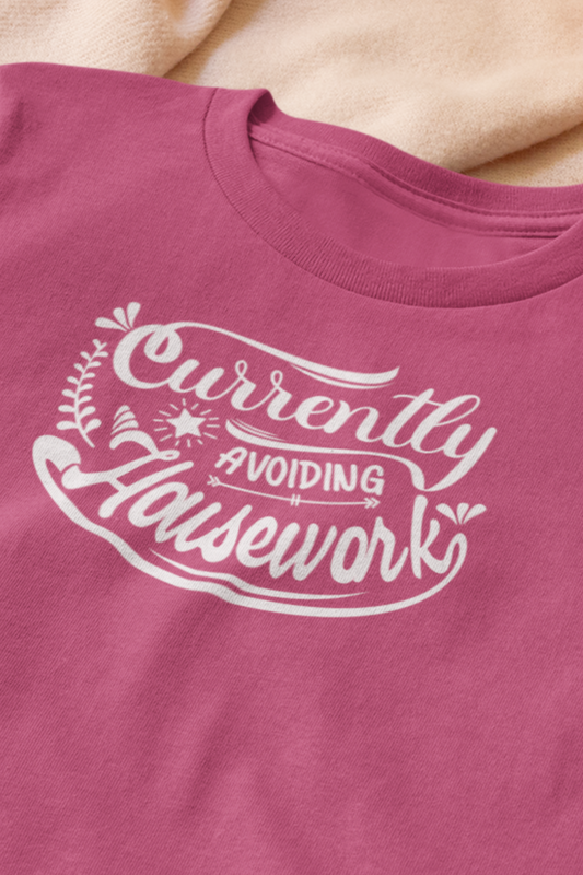 Graphic t-shirt stating 'Currently Avoiding Housework' in color berry