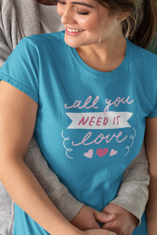 Comfortable Women's Graphic Tee Stating 'All You Need Is Love' in color Turquoise