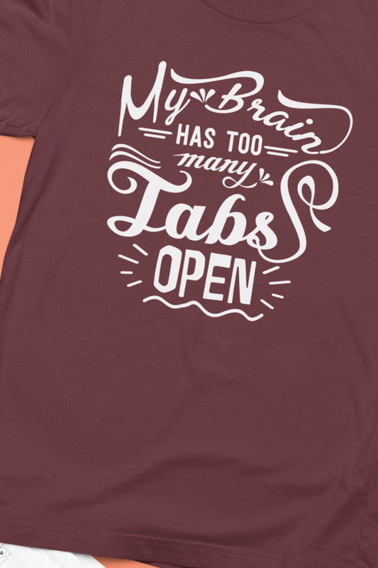 Graphic tee stating 'My brain has too many tabs open' in color maroon