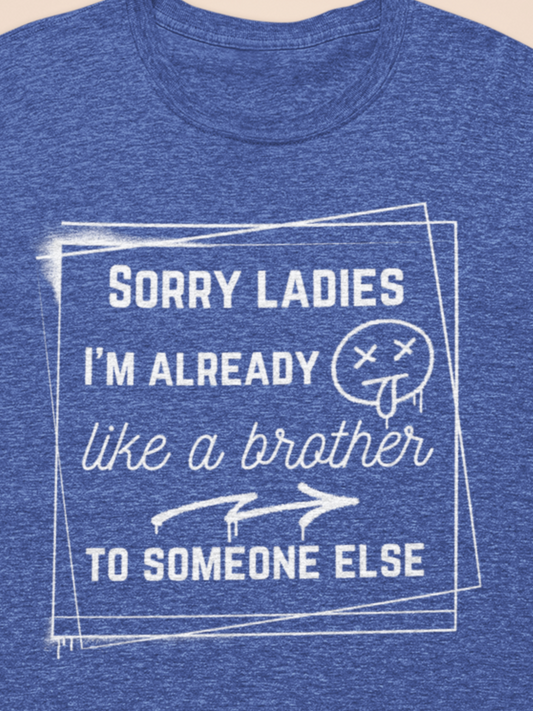 Graphic men's tee stating 'Sorry ladies, I'm already like a brother to someone else' in color true royal heather